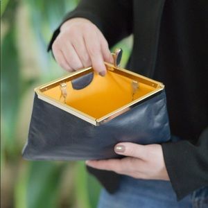 Vintage leather clutch - unique shape!
